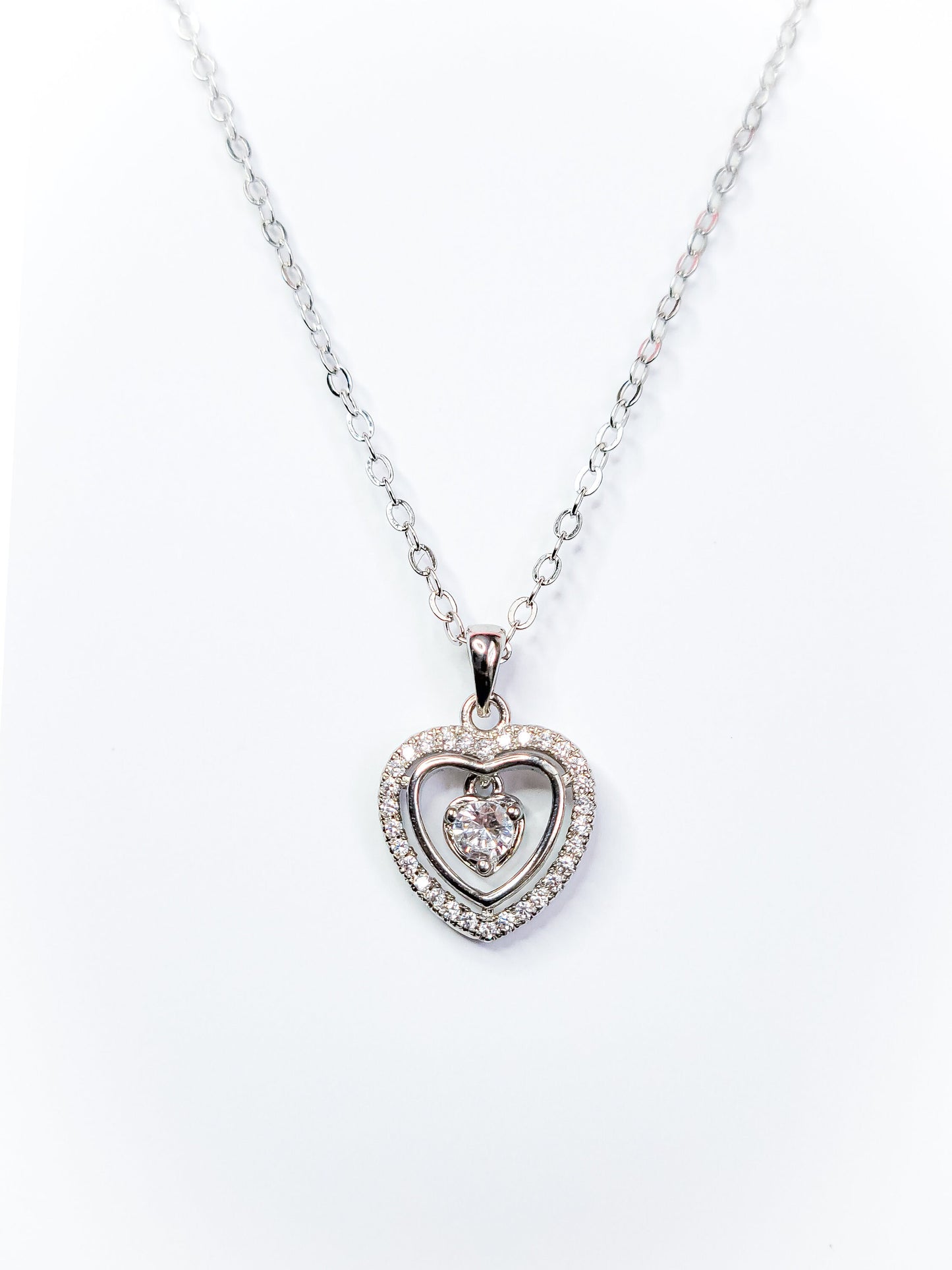 Dainty Cubic Zirconia Round Cut Style 13mm Silver Plated Heart Pendant in 18"